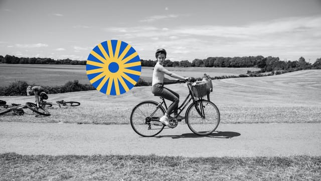 Sweden by Bike logotype with bicycle wheel symbol
